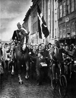 King Christian X of Denmark riding through Copenhagen on his 70th birthday, 26 Sep 1940