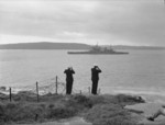 Admiral Bruce Fraser and another officer watching HMS Duke of York entering Sydney Harbour, Australia, 29 Jul 1945