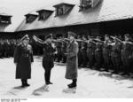Hitler visiting the Ordensburg Vogelsang school in North Rhine-Westphalia, Germany, 29 Apr 1937, photo 1 of 2; Dr. Robert Ley seen with Hitler
