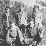 Pilots of Japanese 253rd Air Group Sadakami Komachi (front row, right), Tetsuzo Iwamoto (rear row, left), Tetsutaro Kumagai (rear row, center), and others, Feb 1944