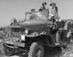 Louis Mountbatten observing Mandalay from a distance aboard a WC command car, Burma, 13-18 Jan 1945