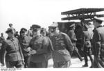 Kranke, Buhle, and Rommel speaking after a weapons demonstration, Northern France, 30 May 1944, photo 2 of 2