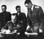 Georgi Zhukov signing the German surrender document, Karlshorst, Berlin, Germany, 8 May 1945, photo 2 of 2