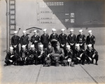 The USS Intrepid photographic unit posing for a photograph with some of their equipment, date and location unknown