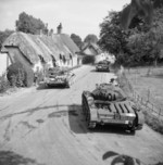 Covenanter tanks passing through the village of Stockton in Wiltshire, England, United Kingdom, 7 Aug 1942