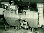 United States Coast Guard DUKW receiving maintenance, date unknown; note truck drive axle, propeller, and rudder