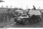 Unloading a Marder I tank destroyer from a train car, Belgium or France, 1943-1944, photo 09 of 10