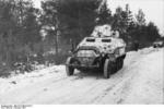 SdKfz. 251 halftrack vehicles in snowy terrain, Russia, Oct 1941, photo 2 of 4; note PaK 36 gun mounted on top of the vehicle