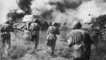 Soviet infantry advancing behind T-34 tanks during the Battle of Orel, Prokhorovka, Russia, 12 Jul 1943
