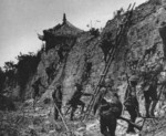 Japanese troops scaling a wall, Baoshan County, Zhejiang, China, 3 Sep 1937