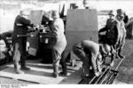 German coastal anti-aircraft gun crew replacing the barrels of a 2 cm Flakvierling 38 mount, possibly in France, circa 1942-1943