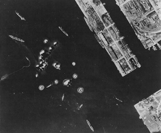 Takao (now Kaohsiung) harbor under US aerial attack, Taiwan, 17 Nov 1944, photo 1 of 5