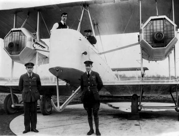 Lieutenant Colonel Pierre van Ryneveld and First Lieutenant Quinton Brand posing before Vimy aircraft 'Silver Queen' before attempting to fly to South Africa; Brooklands, England, UK, 4 Feb 1920