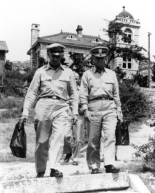 Major General Henry I. Hodes and Rear Admiral Arleigh A. Burke leaving the 'UN House', Kaesong, Korea, Aug 1951