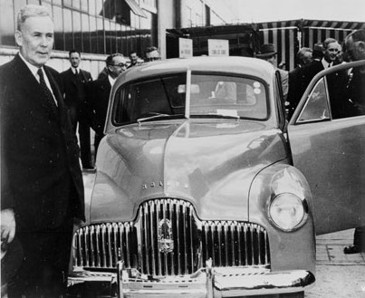 Prime Minister Ben Chifley at the launching of the first mass-produced Australian car at the General Motors-Holden factory, Fisherman's Bend, Melbourne, Australia, 1948