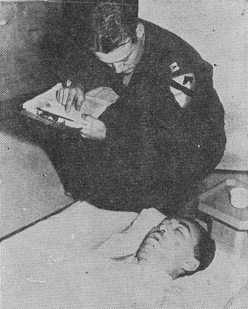 American coroner performing a post-mortem examination for Fumimaro Konoe, Tokyo, Japan, 17 Dec 1945