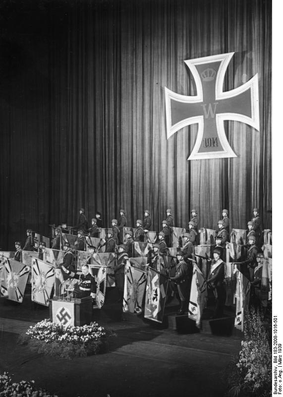 German Navy Grand Admiral Raeder leading a salute during a memorial ceremony, Berlin, Germany, Mar 1939