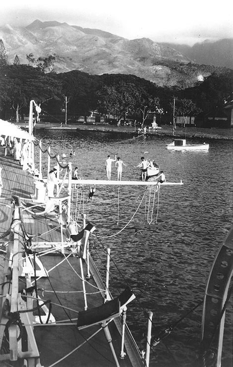 Chicago's crewmen enjoying 'swim call' at Papeete, Tahiti, during the cruiser's shakedown cruise, 1931