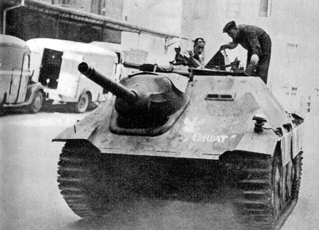 Polish resistance fighters with a captured Jagdpanzer 38(t) tank destroyer, name 'Chwat', Warsaw Uprising, Poland, 14 Aug 1944