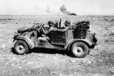 Kübelwagen vehicles of the German Afrikakorps operating in desert conditions, 1940-1943, photo 3 of 3; note the oversize tires that offered better performance on soft surfaces like sand