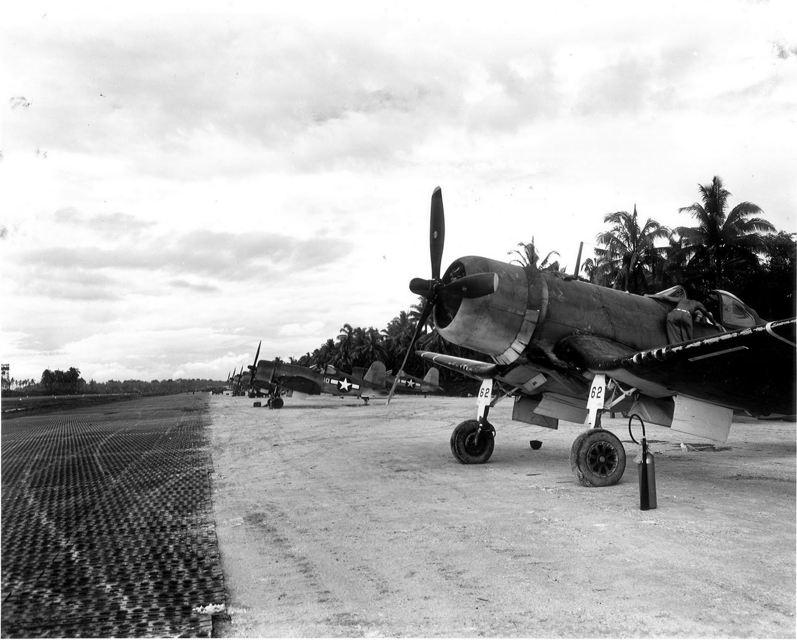 F4U-1A Corsairs of Marine Squadron VMF-216 at Torokina, Bougainville, Solomon Islands, 10 Dec 1943.