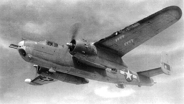 PBJ-1 Mitchell bomber “8-Ball” of Marine Squadron VMB-613 conducts a sector search over the Pacific, 1945. Note 75mm cannon mounted in the nose and radome on the starboard wingtip.