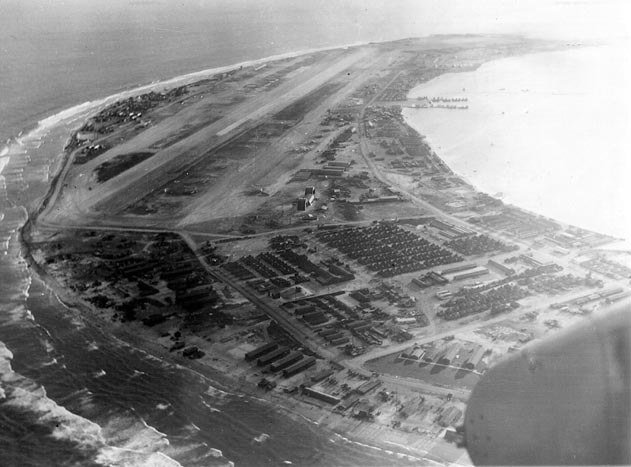 Kwajalein Airstrip, Marshall Islands, as seen from a US Marine PBJ-1 Mitchell bomber of bombing squadron VMB-613, 1944-1945.