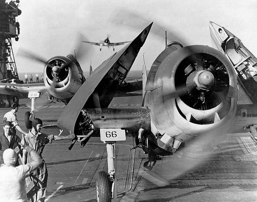 US Navy F6F Hellcat fighters of VF-10 'Grim Reapers' of Carrier Air Group 10 landed on carrier Enterprise after attack on Truk, 17-18 Feb 1944; note folded wings