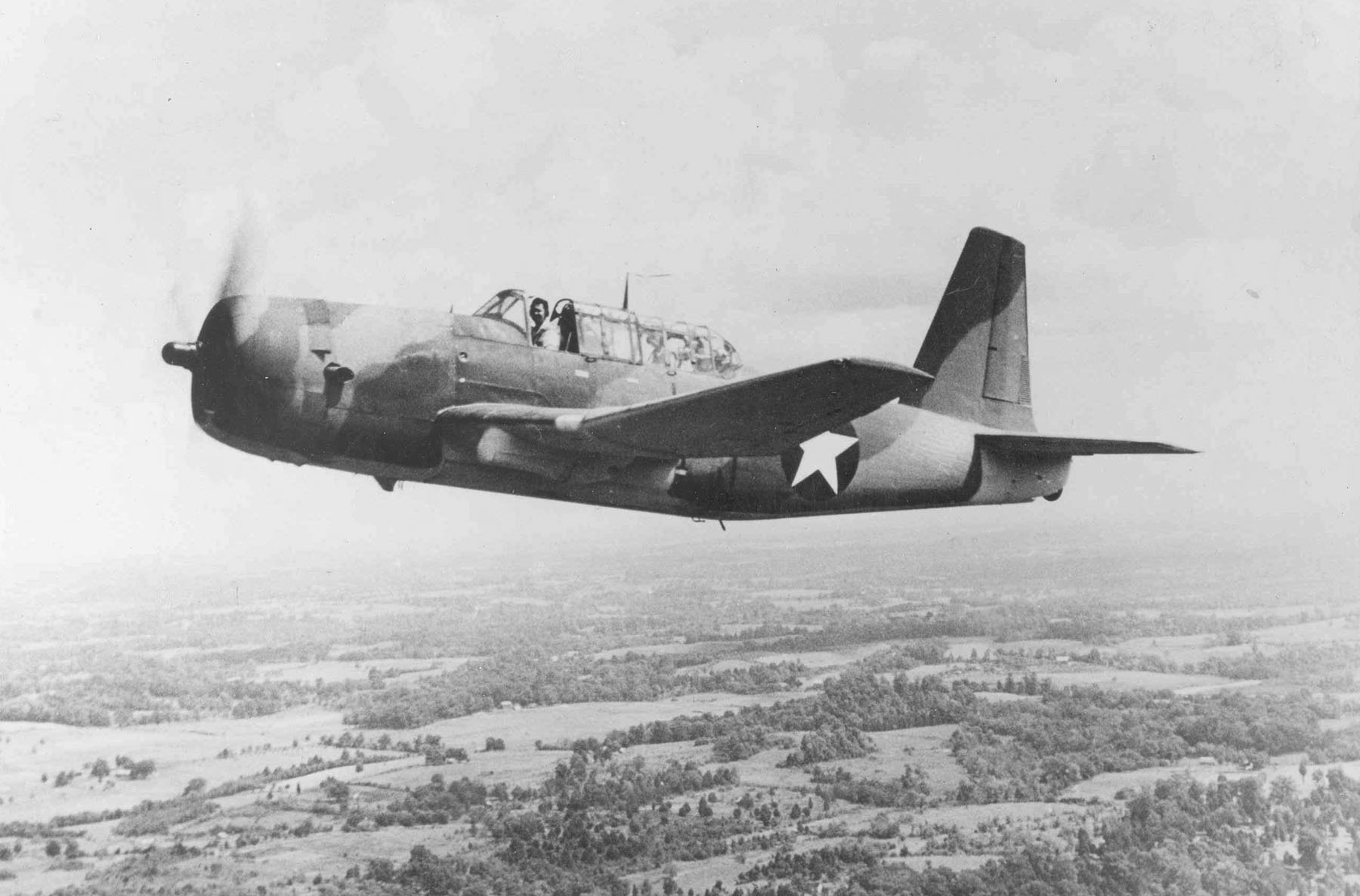 A Vultee A-35 Vengeance dive bomber in flight, Feb-Jun 1943.  This aircraft has undergone the target tug conversion that removed all armament