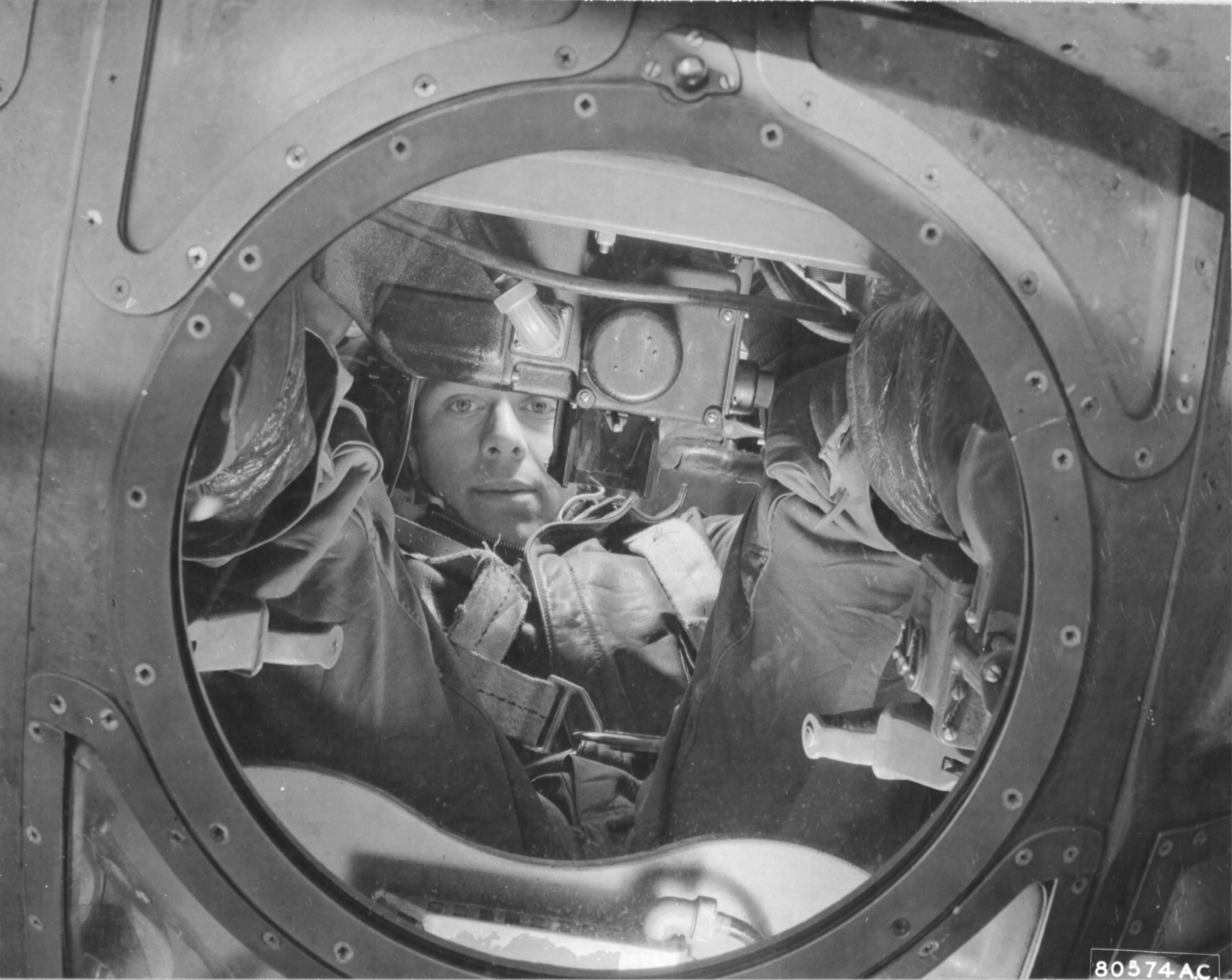 SSgt Norman A Sampson from the 427th Bomb Squadron, 303rd Bomb Group in the ball turret of a B-17 Fortress; RAF Molesworth, Cambridgeshire, England, UK, Apr 1944