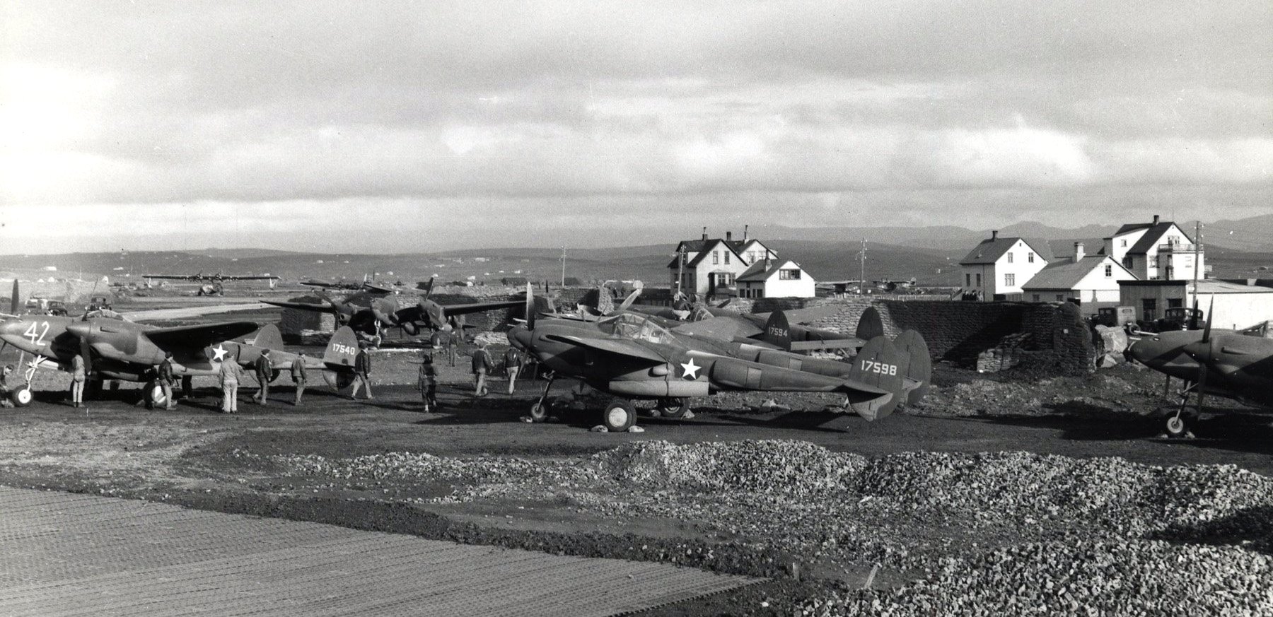 P-38F Lightings refuel in Iceland on their way to Britain, mid-1942. Note PBY Catalina.