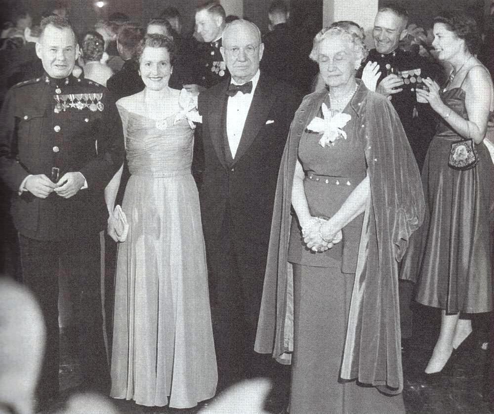 Major General Lewis B “Chesty” Puller and General Holland M. “Howlin’ Mad” Smith (Ret) and their wives at the Marine Corps Ball, 1953.