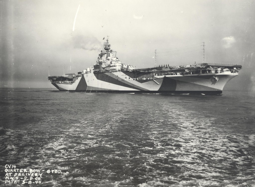 Starboard side view of Essex-class carrier Ticonderoga being delivered to the US Navy on the morning of her commissioning, Hampton Roads, Virginia, Untied States, May 8, 1944.