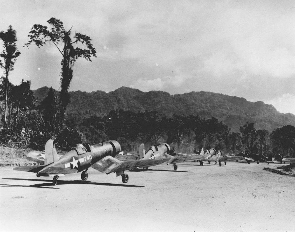 F4U-1 Corsairs of Marine Squadron VMF-214 taxiing for take-off at Torokina Airstrip, Bougainville, Solomons, 1943