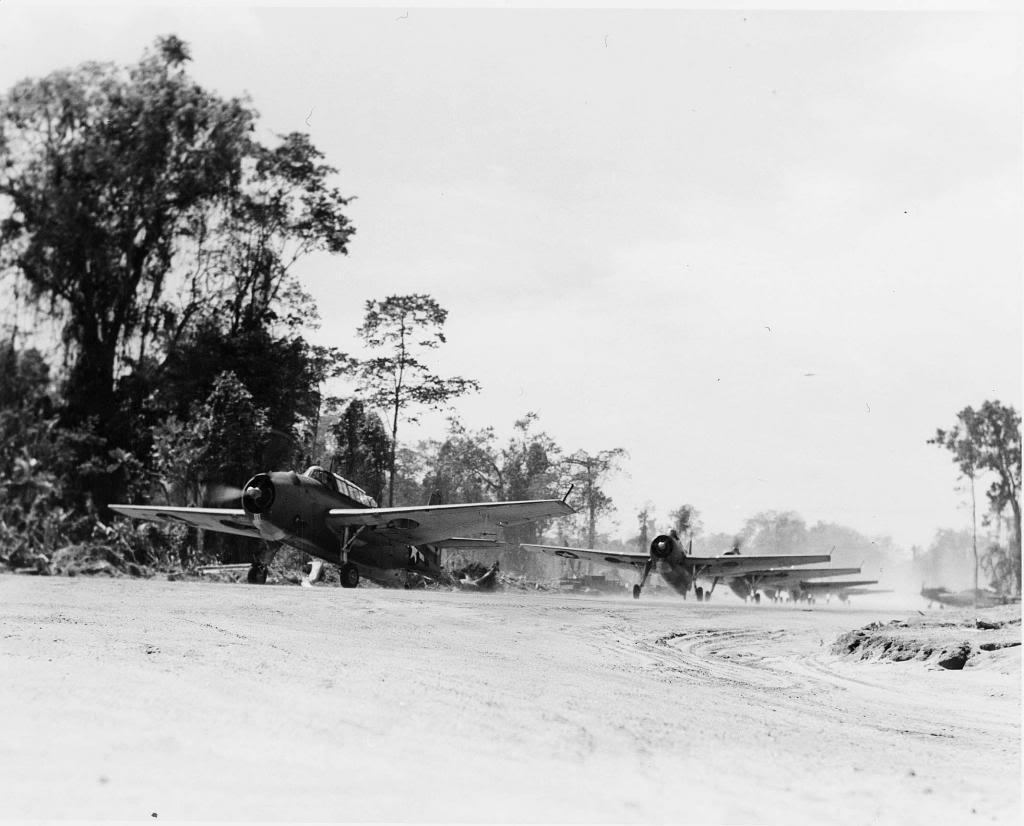 Marine TBM-1 Avengers taxi for take of at Piva Field, Bougainville, Solomons, 1944