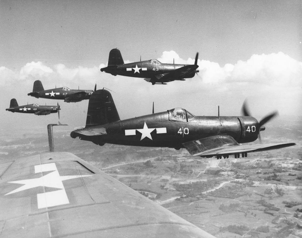 FG-1D Corsairs of Marine Squadron VMF-323 flying over Okinawa, Japan, 1945