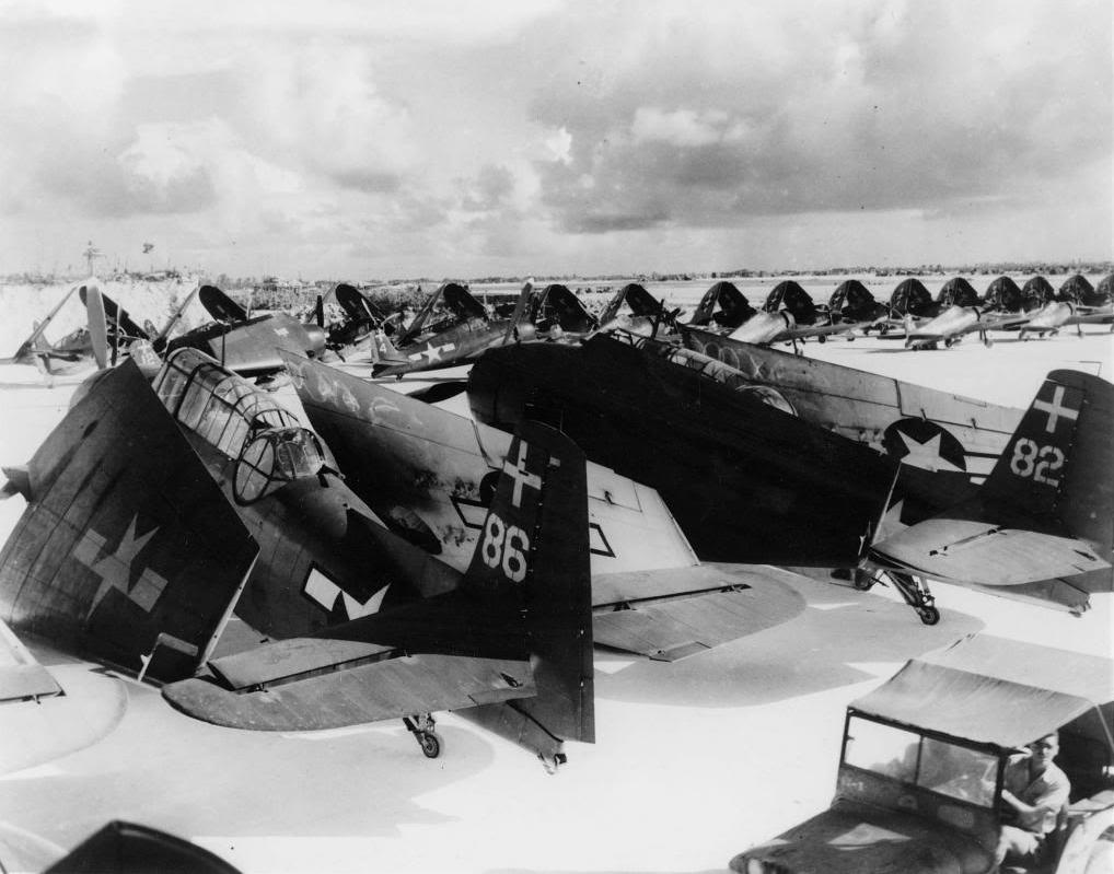 TBM-1C Avengers, F6F Hellcats, and SB2C Helldivers of Navy Carrier Air Group 18 from USS Intrepid at Peleliu, Nov 27, 1944.