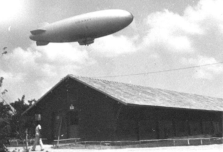 A US Navy K-class airship of Airship Patrol Squadron ZP-42 seen above the mess hall at Santa Cruz Air Base, Brazil, 1944.