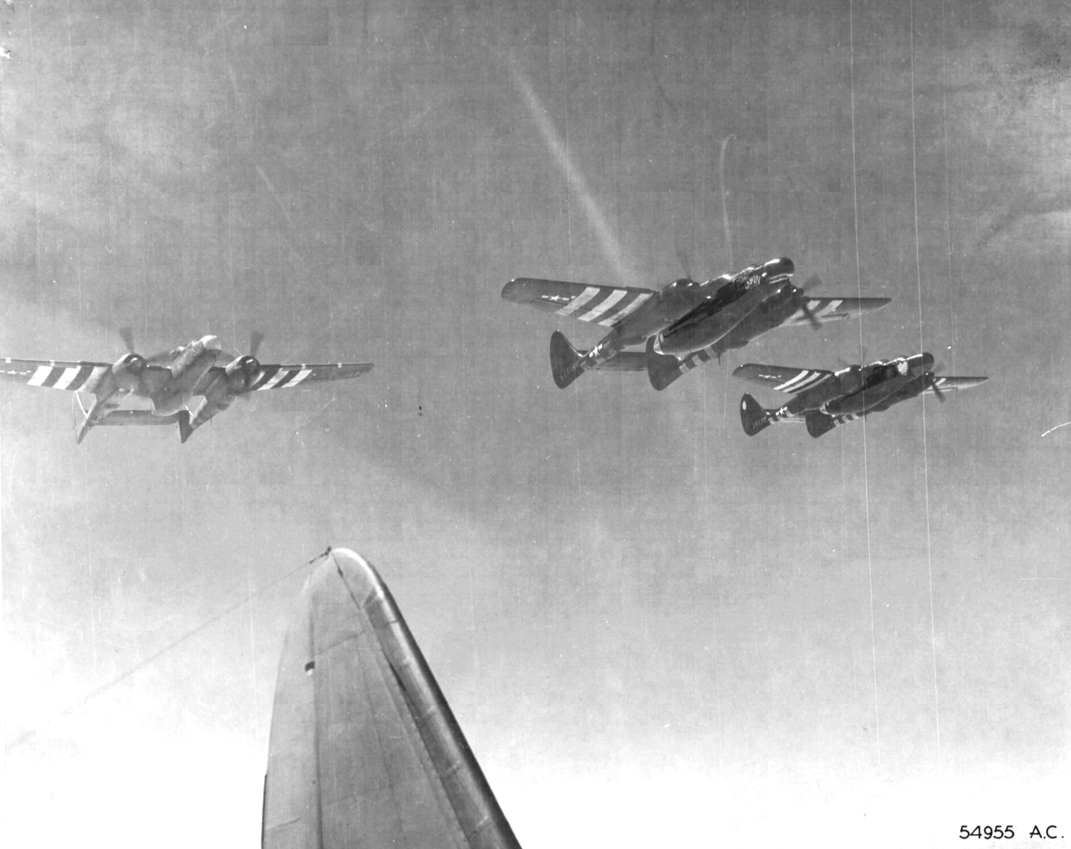 Northrop P-61 Black Widow night fighters of the 422nd Night Fighter Squadron in formation over Western Europe, late Aug 1944