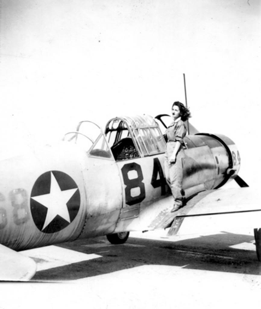 WASP pilot Violet Wierzbicki on the wing of a Vultee BT-13 Valiant, 1943. Location unknown.