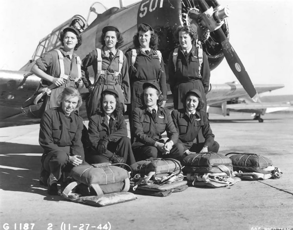 Eight WASP pilots in front of a North American AT-6 Texan 3 days before the WASPs were disbanded, Waco Army Airfield, Texas, United States, Nov 27, 1944. Photo 1 of 2.
