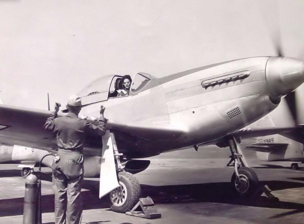 WASP pilot Florene Watson seated in a P-51D Mustang, date and location unknown.