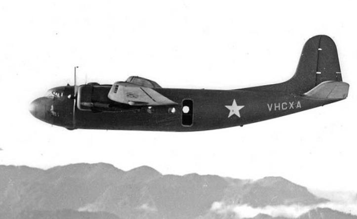 DC-5 (not yet C-110) flying from Australia to Port Moresby, New Guinea, Aug 1942. This plane would be destroyed on the ground by Japanese strafing at 5-Mile Strip, Port Moresby, New Guinea on Aug 17, 1942.
