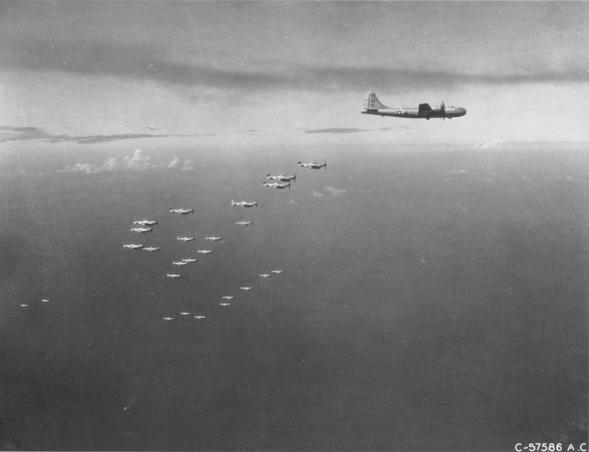 45th Fighter Squadron P-51D Mustangs flying from Iwo Jima flying with a B-29 Superfortress from the 498th Bomb Group, Mar-Apr 1945