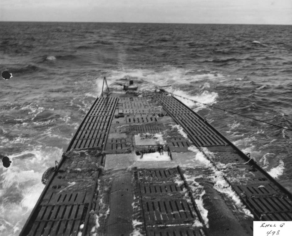 The after decks of the captured German Type IXC submarine U-505 after several days of pumping the bilges finally evened the trim of the U-Boat, 17 Jun 1944.