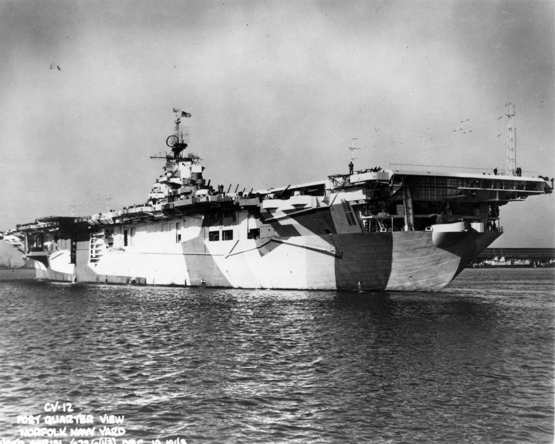 USS Hornet (Essex-class) laying off Norfolk Navy Yard, Portsmouth, Virginia, United States, 19 Dec 1943 shortly after commissioning showing off her MS33/3a paint scheme. Photo 1 of 4.