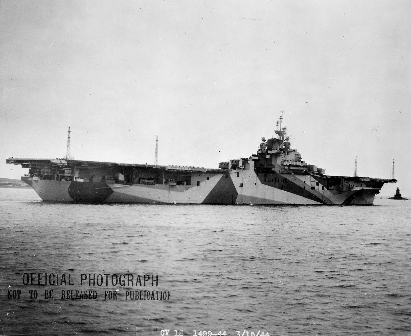 USS Wasp (Essex-class) after her shakedown cruise preparing to leave Boston, Massachusetts, United States, for the Panama Canal, 15 Mar 1944. Note Measure 33/10A camouflage. Photo 2 of 4
