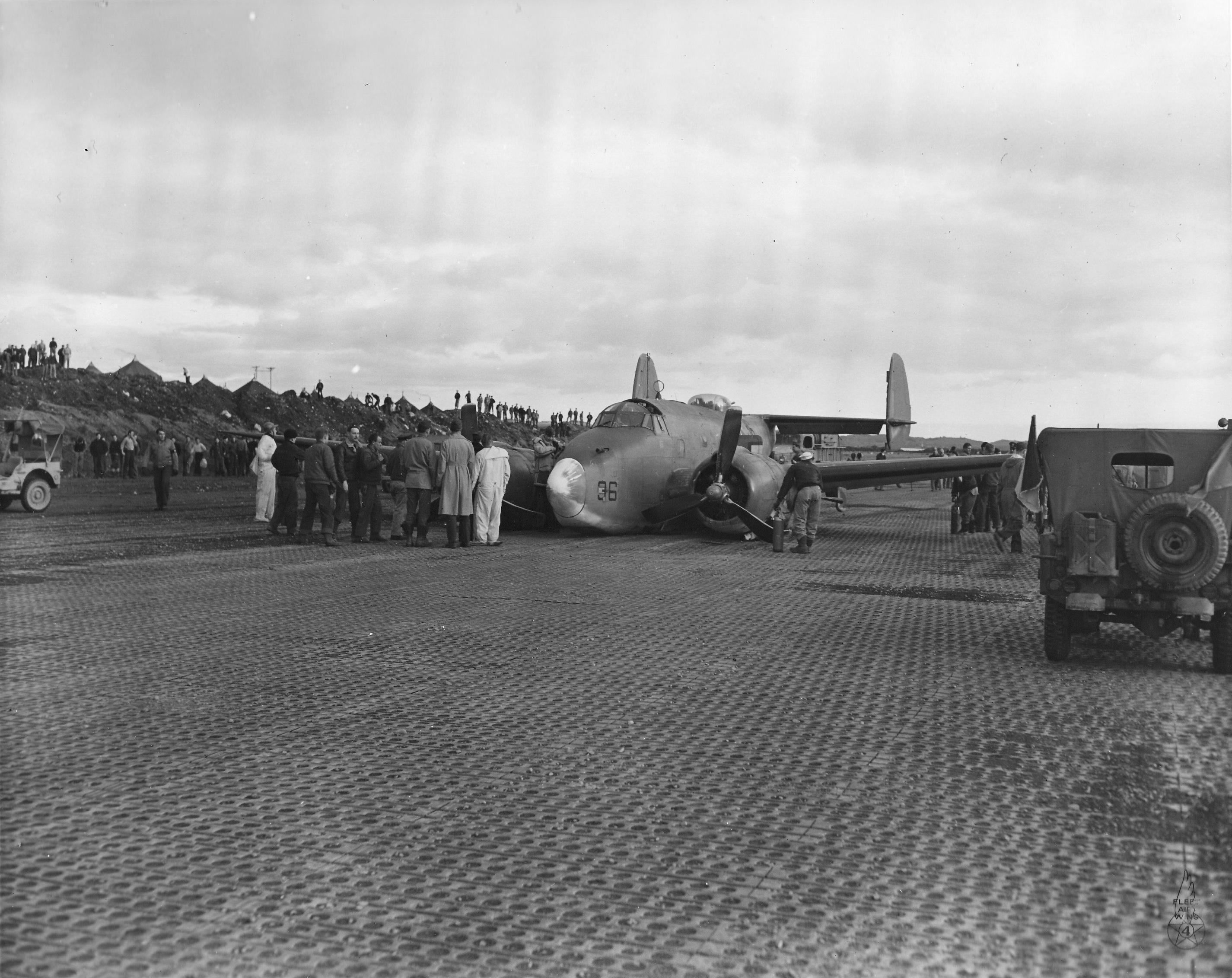 A PV-1 Ventura of Bombing Squadron VB-139 after a belly landing on Attu Island, Alaska, 18 May 1944. This aircraft’s hydraulics were shot out by a Japanese gunboat off the Kamchatka Peninsula. Photo 1 of 2