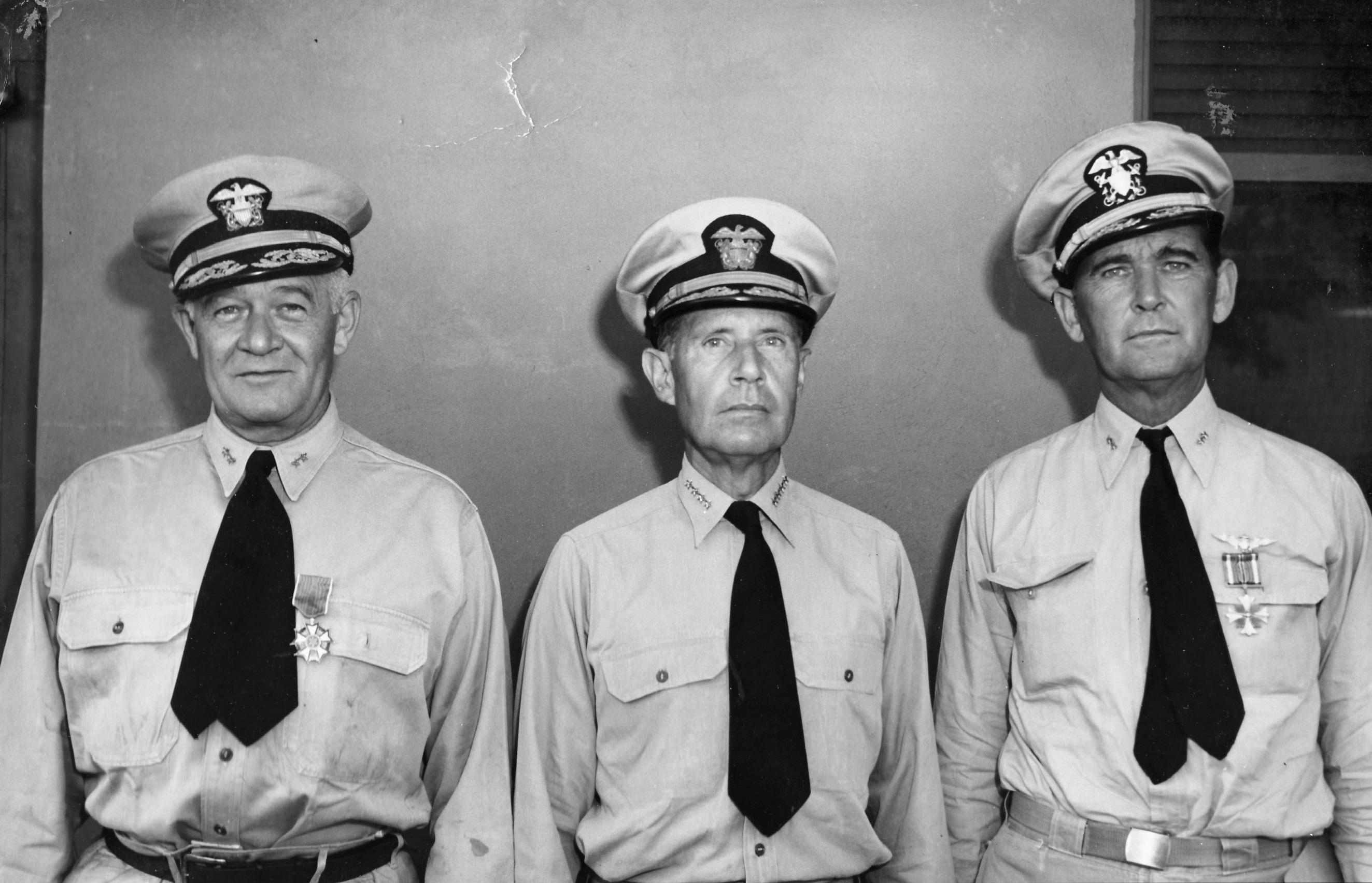 Admiral Raymond Spruance with the day’s two honorees, Rear Admiral Robert Giffen who had just received the Legion of Merit and Rear Admiral John Dale Price who had just received the Distinguished Flying Cross, early 1944