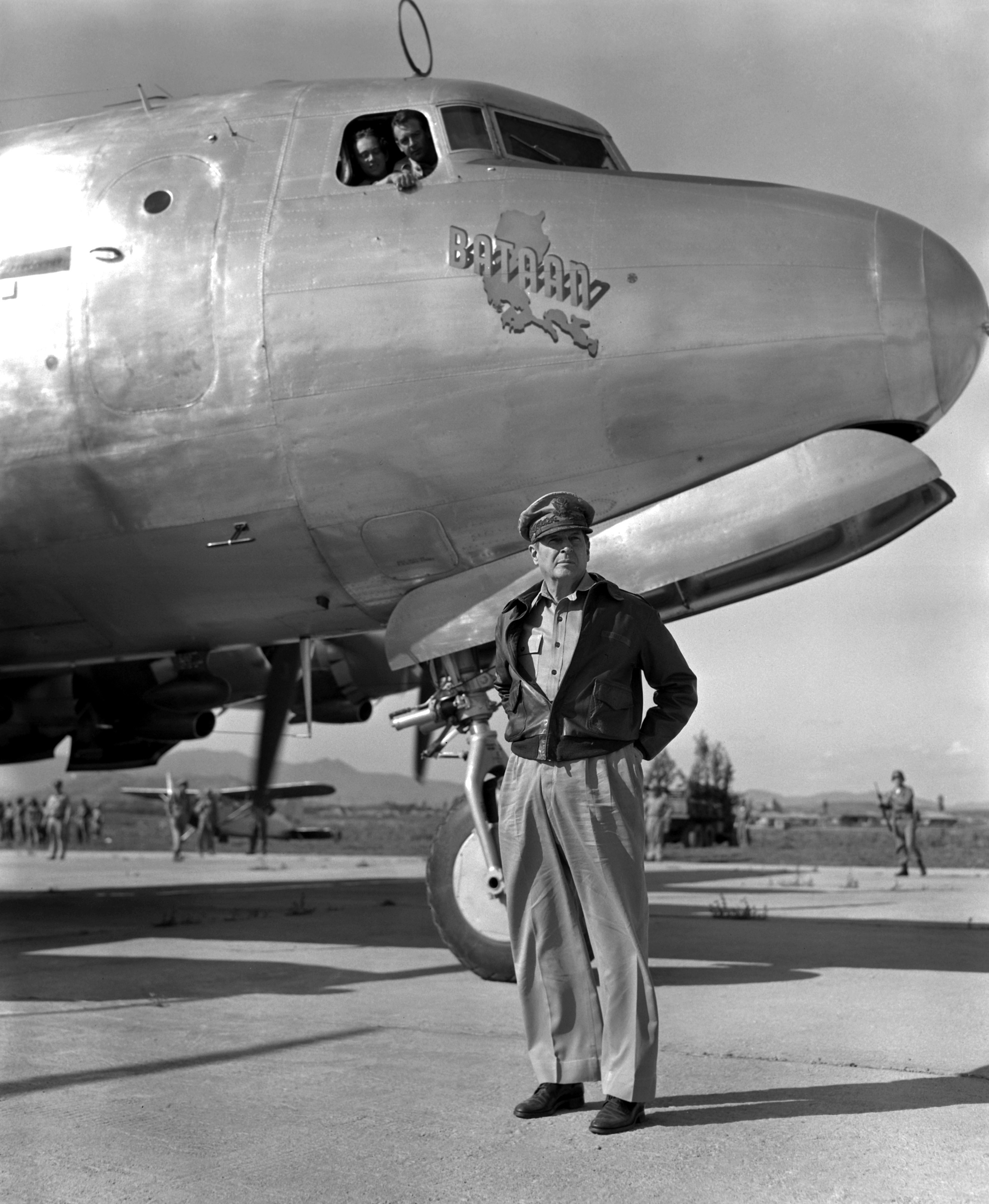 Douglas MacArthur in Korea, 1950-1951; note MacArthur's personal C-54 Skymaster transport aircraft 'Bataan'